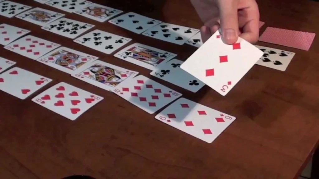 How To Play Elevens Card Game: Simple Rules And Fun Elevens Card Game setup with 9 face-up cards